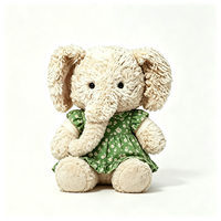 Vente en gros d'éléphant en peluche doux et bouclé, vêtu d'une robe verte à fleurs, design personnalisé, mascotte, cadeau, jouet en peluche