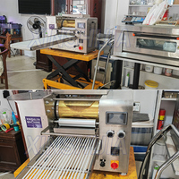 Machine à laminer la pâte Chapati entièrement automatique Machine à fabriquer les crêpes industrielles et commerciales à mille couches Machine à presser les croûtes