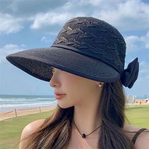 Chapeau de soleil pliable en paille tressée avec nœud ajouré pour femme – Vente en gros - Product Image 2