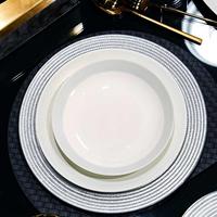 Service de table en porcelaine fine blanche gaufrée, vaisselle élégante et minimaliste en céramique pour la maison