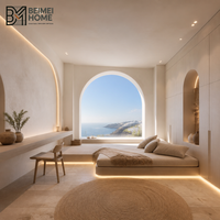 Lit de jour tatami sur mesure de style cycladique grec avec armoire incurvée intégrée pour villa de villégiature méditerranéenne