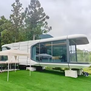 Maison de conteneur à structure en acier préfabriquée de luxe de 20 pieds/40 pieds Maison mobile de vente en gros de capsule spatiale chinoise pour motel Resort - Product Image 1