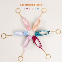 Porte-clés unique en cuir écologique fait main avec pendentif en alliage de zinc gaufré en forme de pointe de danse classique, mini-accessoire