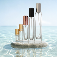 Meilleur prix de gros pour flacon de parfum en verre cylindrique haut avec pompe pulvérisatrice métallique pour les marques de cosmétiques et de soins personnels