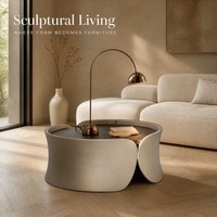 Table basse sculpturale avec plateau rond et base incurvée en forme de pétale, table d'appoint moderne pour salon et côté canapé