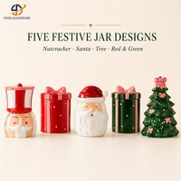 Pot à bougie en céramique brillant Père Noël avec couvercle en forme de chapeau rouge pour la décoration de Noël à la maison et les boutiques de cadeaux de fin d'année (vente en gros)
