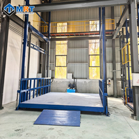 Ascenseur de fret hydraulique certifié CE, élévateur de sécurité pour charges destiné aux bâtiments industriels