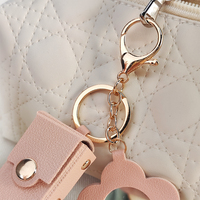 Mignon fleur miroir PU cuir cadeau pendentif idée sac étiquette Mini rouge à lèvres sac de rangement luxe porte-clés