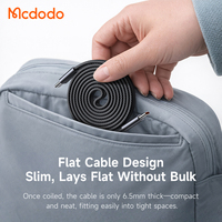 Câble magnétique USB-C Mcdodo 990/991 240W à enroulement automatique, 1M, ultra-plat, charge rapide PD, conception anti-emmêlement pour bureau/voyage