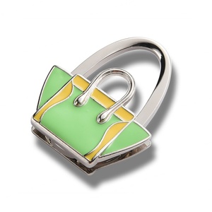 Les fabricants produisent des crochets métalliques pliables à la mode, des crochets pour sacs de femmes, personnalisables. - Product Image 1