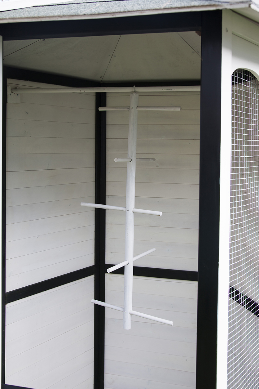 large wooden parrot cage