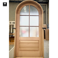 Portes en bois cintrées sophistiquées avec panneaux en verre pour maisons et serrure intelligente Charme classique avec portes de sécurité modernes