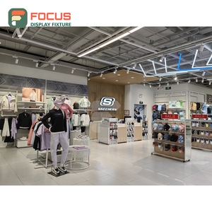 Customized Retail Outlet Brushed Stainless Steel Glass Showcase Installation Service Franchise Clothing Store - Product Image 1