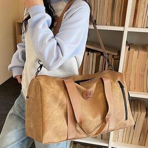 Bolsa de Viaje Deportiva Unisex de Tela Vaquera PU con Logotipo Personalizado, Bolsa de Gimnasio y Entrenamiento Impermeable para Hombre y Mujer, Capacidad de 36-55L - Product Image 1
