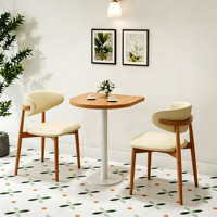 Table basse minimaliste moderne avec chaises rembourrées à structure en bois massif, ensemble table et chaises pour cafés et restaurants