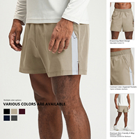 Shorts de sport mi-taille pour hommes avec taille élastique et poches zippées contrastées - Coupe ajustable pour tenue active