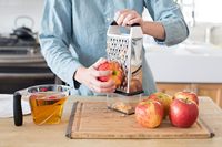 RVS multifunctionele groente- en fruitrasp met 4 zijden, keukenhulp met opvangbak, kaassnijder, -hakker