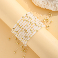 Lot de 10 bracelets ajustables en résine perlée pour femme avec perles imitation nacre et cordon coulissant doré – Idéal comme cadeau
