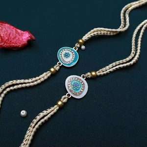 Shubh Dhaga Bhai Rakhi Combo Saludos Regalo Evil Eyee Rakhi y Pearl Rakhi Pulsera Rakhi Hermano Raksha Bandhan Regalo - Product Image 1
