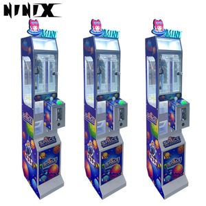 Máquina de garras recreativa para dulces, piruletas, juguetes pequeños y muñecas, para uso doméstico infantil, máquina expendedora de regalos, máquina de entretenimiento tipo arcade. Precios. - Product Image 3