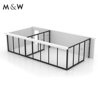 Cloison de séparation en verre insonorisée modulaire pleine hauteur en aluminium moderne et élégante M&W pour studio de musique et école