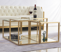 Ensemble de table basse de luxe 4 pièces en acier inoxydable doré avec plateau en verre trempé, table centrale modulable pour la maison et l'hôtel