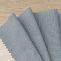 Tissu DTY en nylon mat à faible élasticité Shaoxing Yuyuan, mélange 92%N 8%SP, 73GSM, fin et doux, pour veste coupe-vent de protection solaire d'extérieur