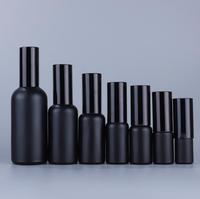 Emballage cosmétique bon marché noir mat or argent couvercles parfum rechargeable chambre vaporisateur bouteille en verre 100ml