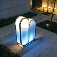 Lampadaire LED extérieur double ovale moderne (en métal) pour éclairage décoratif de paysage de place commerciale, RVB à changement de couleur, IP65, télécommande