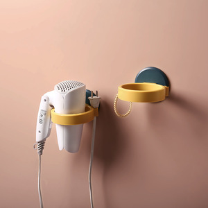 Wall Mounted Hair Dryer Holder Suction Cup Mount Circular Design For Bathroom Storage Durable Yellow White Black Color Options - Product Image 1
