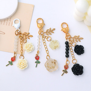 Stile moda in resina con ciondolo a forma di cammello portachiavi con ciondolo a forma di fiore per cuffia borsa Charm camelia KerRing accessori portachiavi - Product Image 3