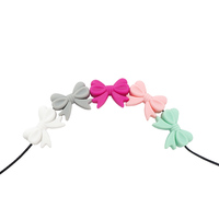 Livraison rapide, perles à mâcher en forme de nœud papillon, trou vertical, accessoires pour chaînes de sucettes DIY, perles focales en silicone pour bébé sans BPA