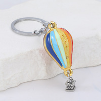 Nouveau style créatif, pendentif rond en alliage de zinc, porte-clés montgolfière, souvenir de sport de plein air, cadeau nuage, vente en gros