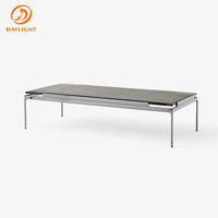 Table basse trapézoïdale minimaliste moderne, plateau en bois brun et base vert mat, table d'appoint créative pour salon