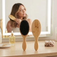 Brosse à cheveux en bois de bambou à poils de sanglier, logo personnalisé, antistatique, coussin d'air, peigne de salon, vente en gros