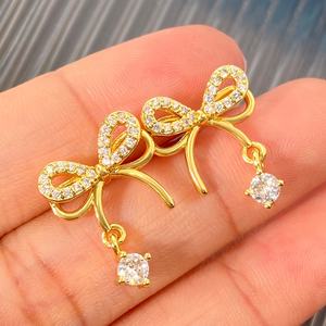 Pendientes de moda coreanos con borlas de circonita cúbica, chapados en oro, con lazo y dije de mariposa para mujer - Product Image 4