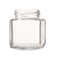Sonderform Sechseck 180ml 6,0 Unzen Honig Oval Hex Erdnuss butter Marmelade Honig glas Gläser mit Schwarz gold Metallic Deckel