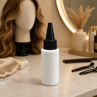 Flacon cylindrique compressible en PEHD de 30 ml (1 oz) avec bouchon à vis et embout applicateur sérigraphié pour huile capillaire et lotion