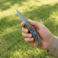Couteau de survie pliant d'extérieur, couteau de poche pliant en acier Damas, couteau de survie en milieu sauvage, manche en laiton Baobei Shell
