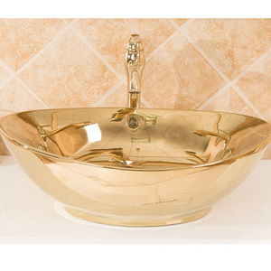 Lavabo en céramique plaqué or de haute qualité KD-10GBB pour hôtel, lavabo de salle à manger en forme de lune dorée - Product Image 1