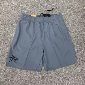 Pantalones cortos deportivos de poliéster en blanco personalizados para hombre, pantalones cortos transpirables de secado rápido para gimnasio, pantalones cortos para correr - Product Image 1