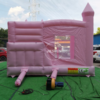 Château gonflable miniature rose pastel, combo château gonflable, trampoline gonflable, château gonflable avec porte en filet amovible à vendre