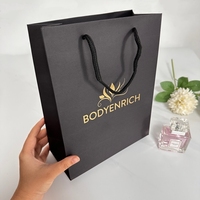 Sac de shopping pliable noir personnalisé, logo imprimé sur mesure, sac de transport pour boutique, vêtements, bijoux, cadeaux, sac de shopping en papier kraft