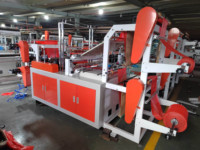 Machine automatique de fabrication de sacs à rouleaux avec noyau