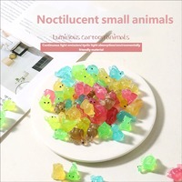 Figurines d'animaux de dessin animé de haute qualité qui brillent dans le noir (lapin/chiot) en résine pour la décoration d'aquarium