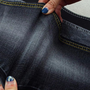 Tela vaquera elástica negra con efecto azufre para jeans - Product Image 1