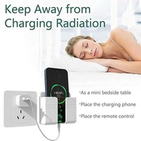 Stock populaire nouveau support de téléphone mural support de chargeur mural adhésif pour téléphone portable et support de télécommande