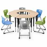 Ensemble de tables scolaires hexagonales modulaires et empilables avec chaises en plastique pour les discussions de groupe en classe