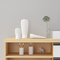Tubes souples en silicone personnalisables de qualité alimentaire, vente en gros d'usine, contenants portables rechargeables pour soins de la peau avec couvercle à clapet