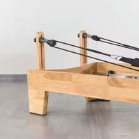 Cadillac Fitness Equipment Pilates Reformer Bed en bois PU d'occasion pour la musculation à domicile et la pratique du yoga